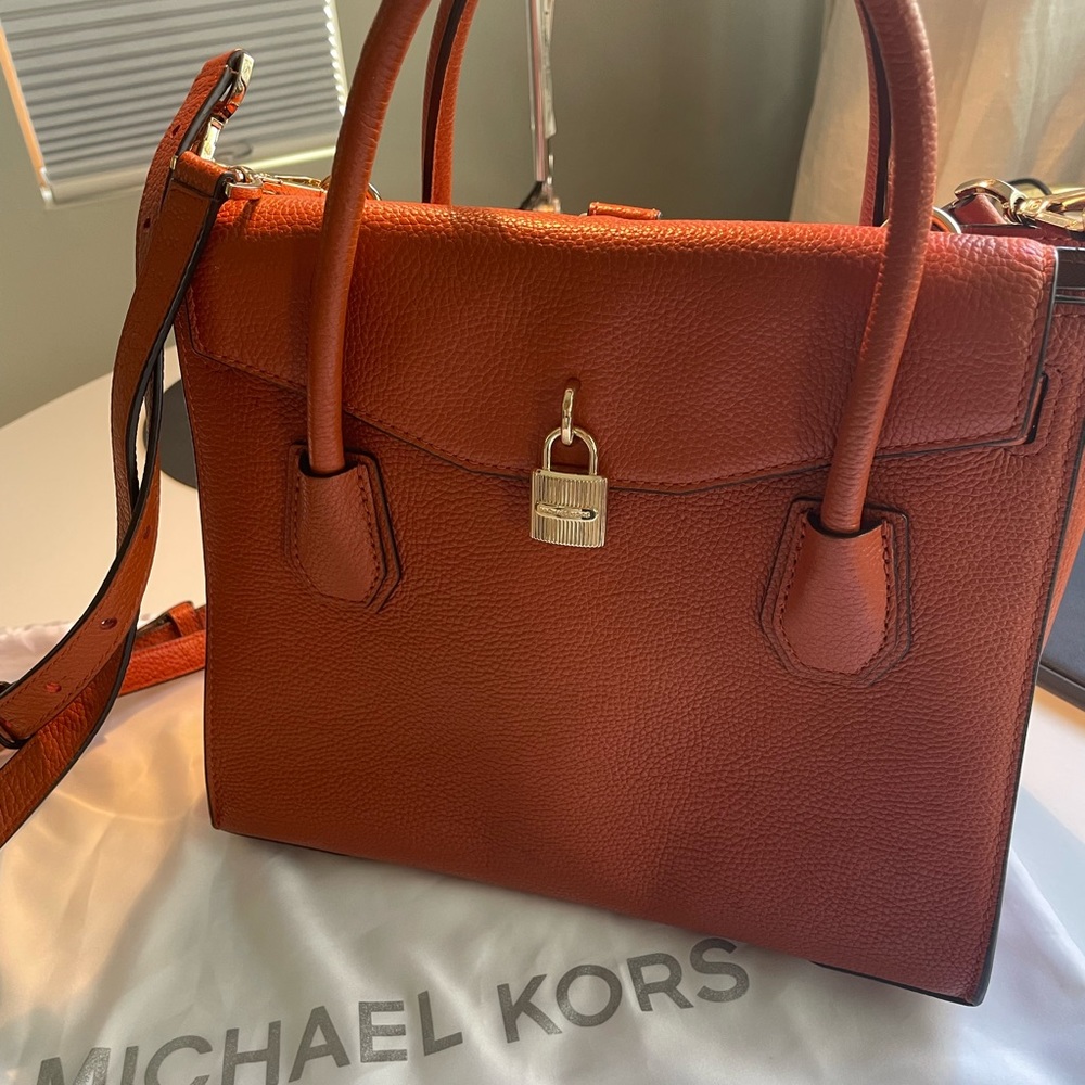 Michael Kors medium satchel with a cross body purse. Comes with dust bag.